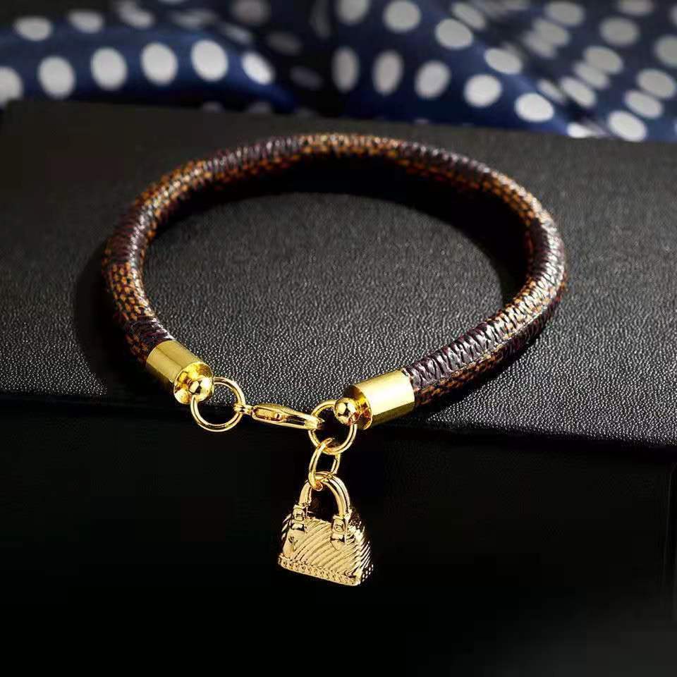 

Presbyopia leather rope magnetic buckle bracelet carved leather fashion couples bracelet men and women lucky rope free shipping