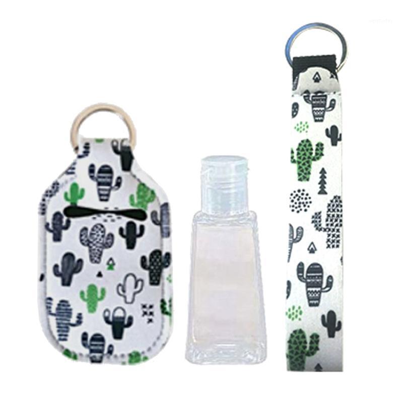 

Portable 1 oz Refillable Empty Travel Bottles with Wristlet Keychain Holder Set1