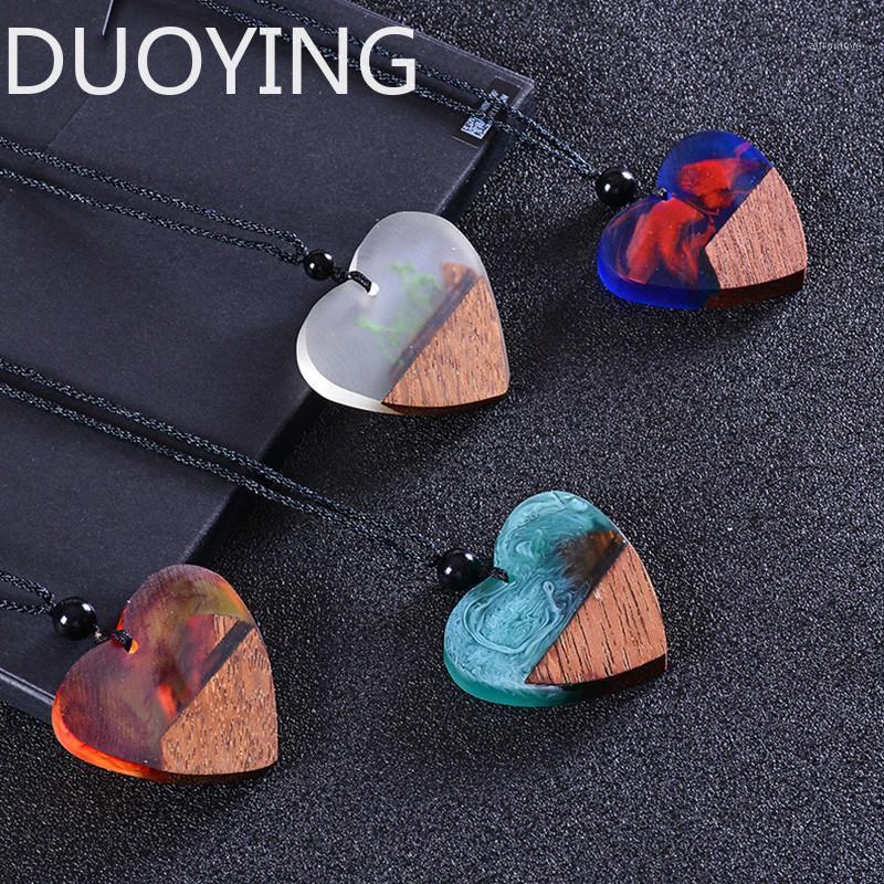 

Fashion Vintage Heart-shaped Resin Wood Necklace Handmade Long Rope Wooden Pendants Necklace Jewelry for Men Women Birthday Gift1