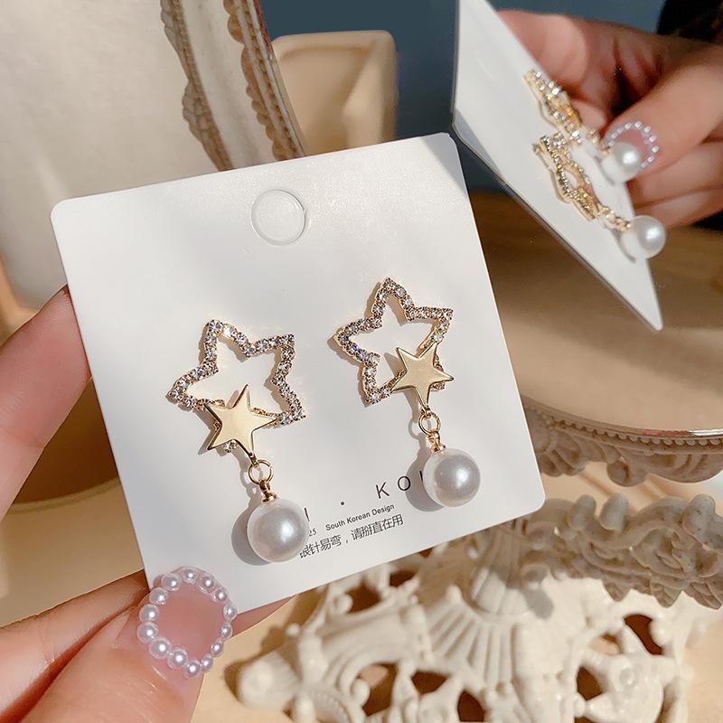 

New Korean temperament fashion high-end earrings female five-pointed star pearl earrings diamond net red