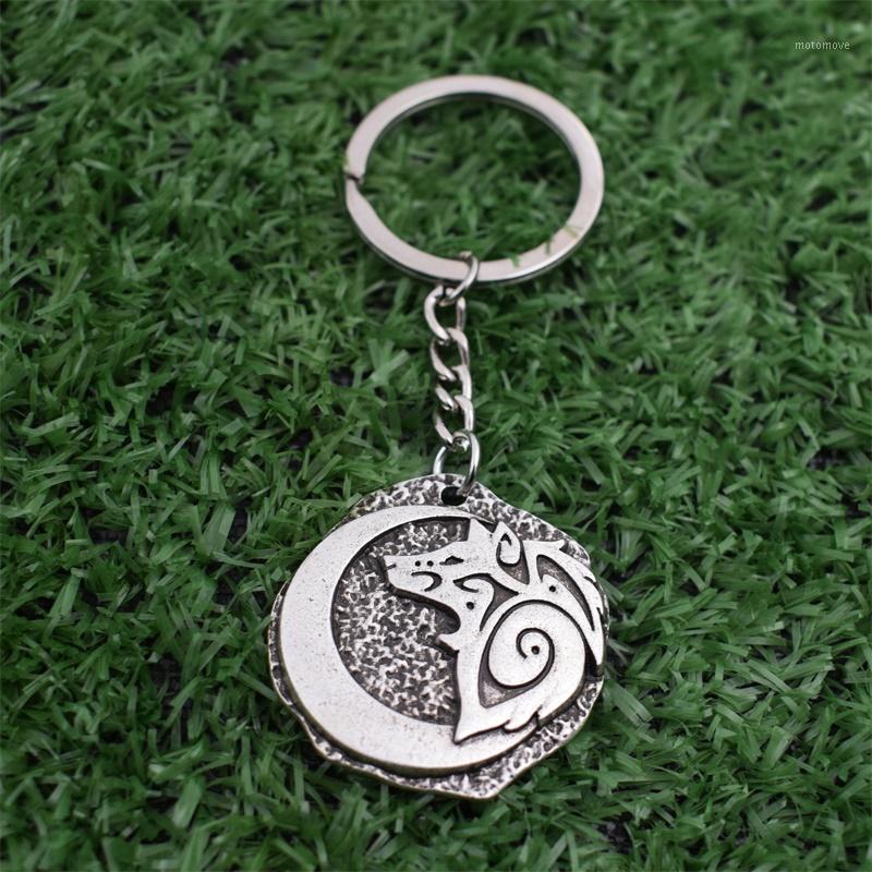 

12pcs Large Tribal Wolf keychain Crescent Moon Wolf Head Animal Keyring Lover Gift1