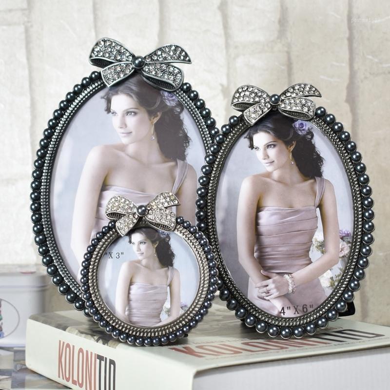 

European style 6 Inch 7 Inch Originality Lovely Ellipse Frame Wedding Dress Photographic Studio Photo Frame Wash Photo1