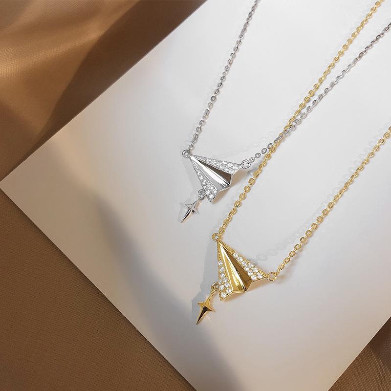 

ANENJERY 925 Sterling Silver Simple Tiny Paper Plane Airplane Zircon Pendant Necklace for Women Clavicle Chain Necklace S-N687