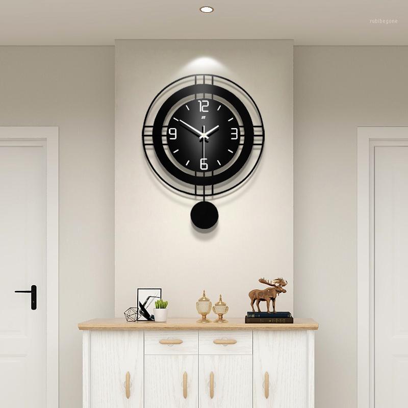 

Creative Nordic Pendulum Battery Wall Clock Metal MDF Black Modern Wall Clock For Home1