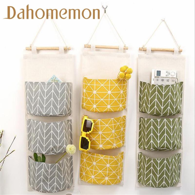 

Creative cotton and linen waterproof storage hanging bag multi-layer hanging pocket cloth door after the debris storage bag