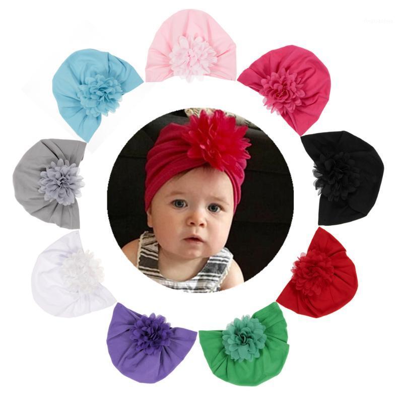

10pcs/lot Baby Girls Turban Hat Chiffon Flower Cotton Blend Newborn Caps Beanie Top Knot Handmade Hats Birthday Christmas Gift1