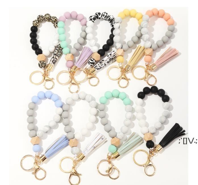 

Fedex 9 Colors Wooden Tassel Party Favor Bead String Bracelet Keychain Food Grade Silicone Beads Bracelets Women Girl Keyring Wrist Strap