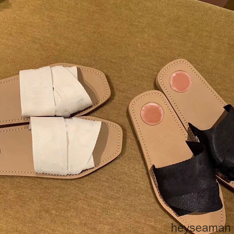 

Slippers Branded est canvas Women Fflat Rome woody Slipper Deisgner Lady Lettering Fabric Outdoor Leather Sole Slide Cross braided tape NN42, 2# shoe box