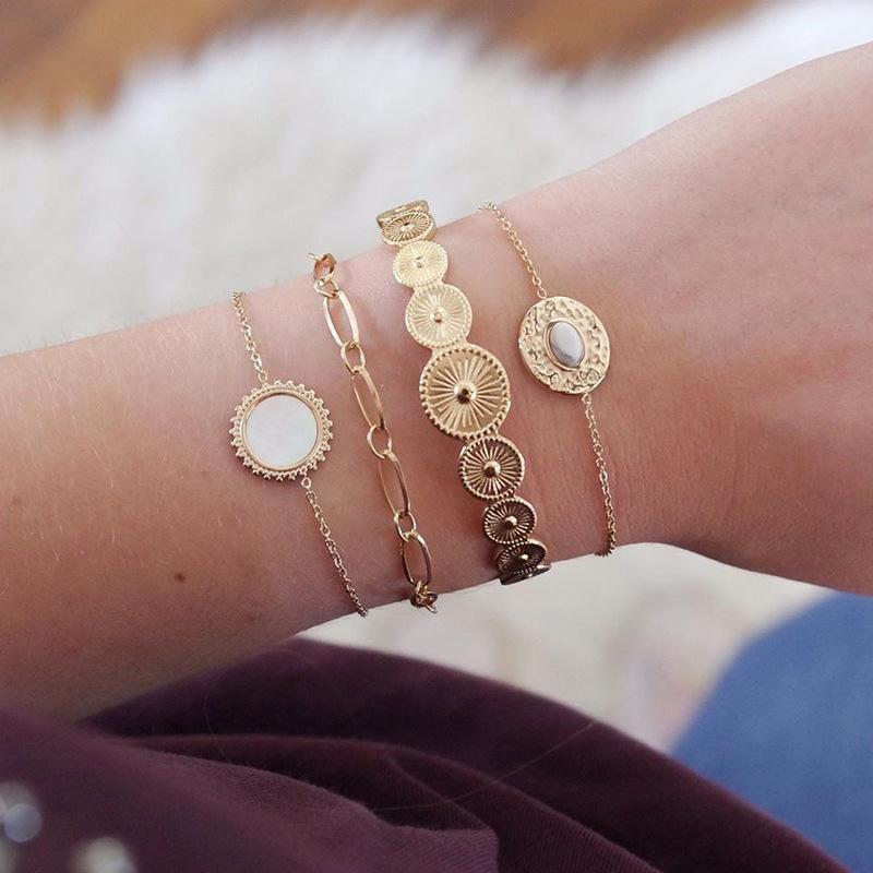 

Scandinavian style sun flower inlaid bracelet set with hammered chain simple dripping oil bracelet 4-piece set for women1