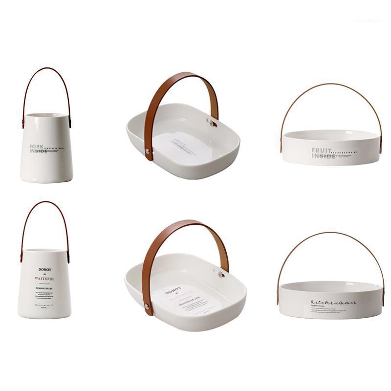 

Unique Chic Nordic Ceramics Storage Jar Bottle With Leather Handle Minimalist Desk Storage Bottle Organizer Flower Vase Containe1