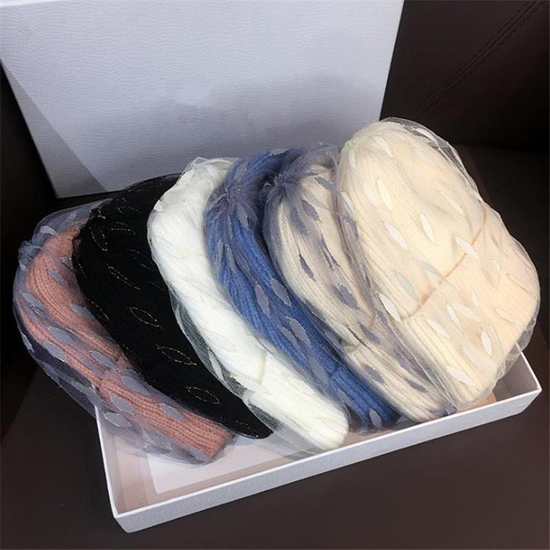 

2020 christmas new autumn winter mesh wave point knitted hat pure wool warm European and American hat