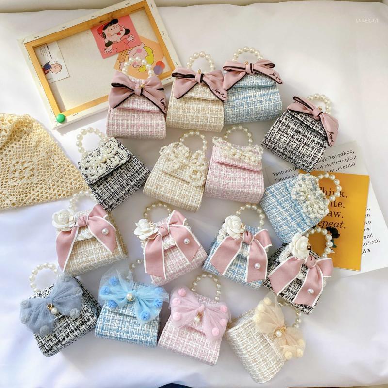 

Korean Kids Mini Purses and Handbags 2020 Cute Crossbody Bags for Girls Small Coin Pouch Little Girl Party Pearl Hand Bags Gift1