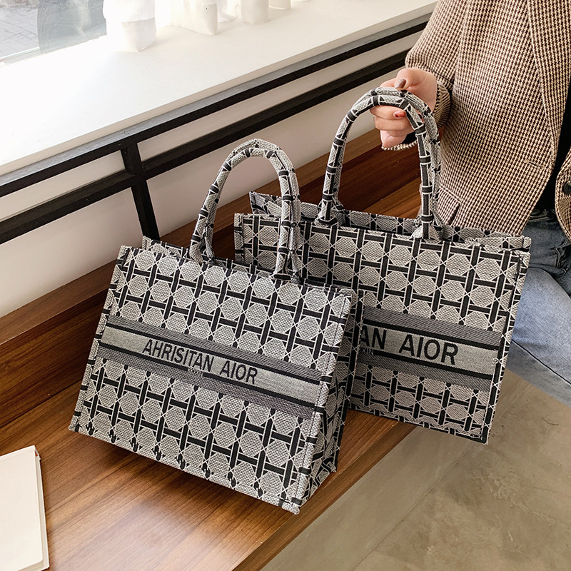 

Portable shopping women 2021 new high capacity fashion canvas embroidery one shoulder women's net red hand Tote bag