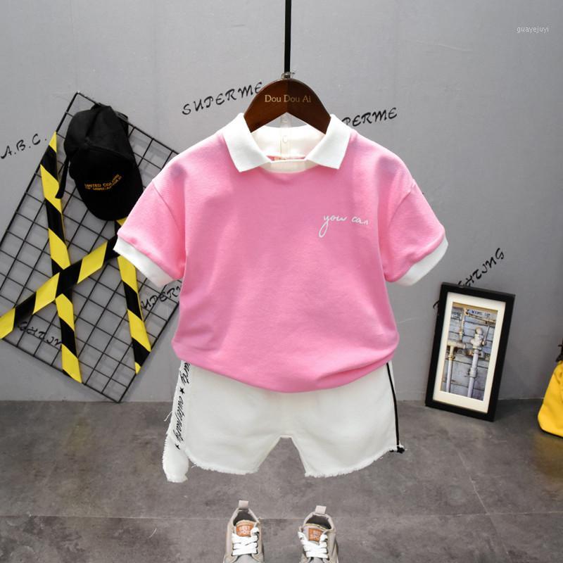 

DFXD New 2020 Summer Toddler Boy Clothes Set Turn Down Collar Pink T-shirt White Shorts Pants Children Clothing Sets Casual Suit1