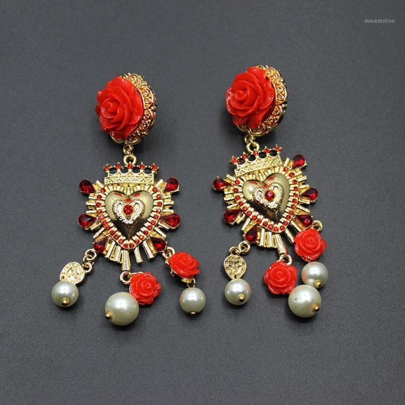 

2020 new European and American fashion Baroque ceramic red safflower pearl long section tassel earrings 1171