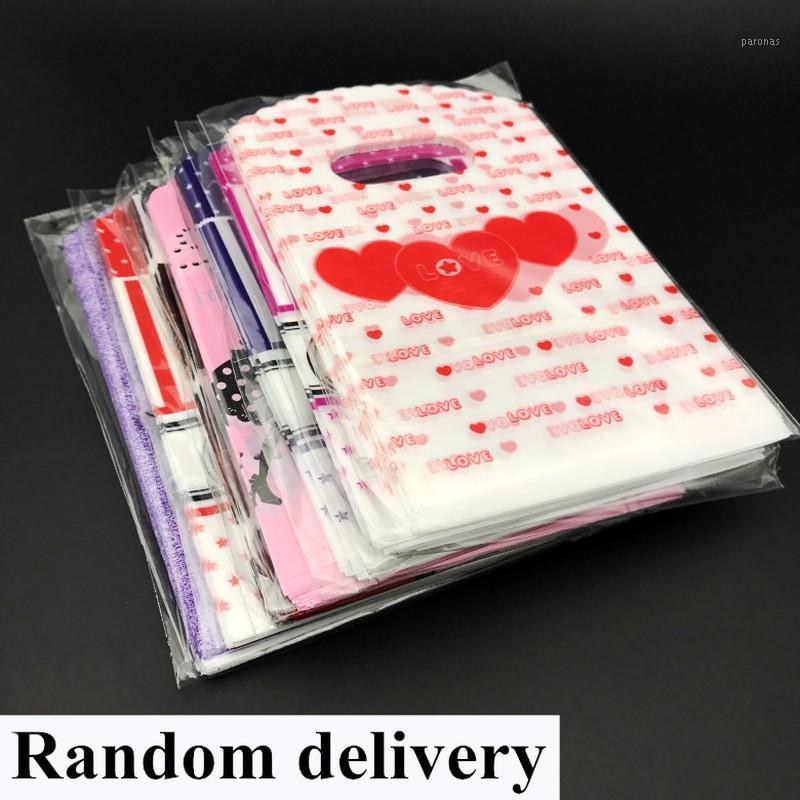 

50pcs 10*15cm Multi Style Plastic Handle Bag Small Jewelry Packing Party Favor Pouch For Candy Cookie Gift Box Packaging Bag1