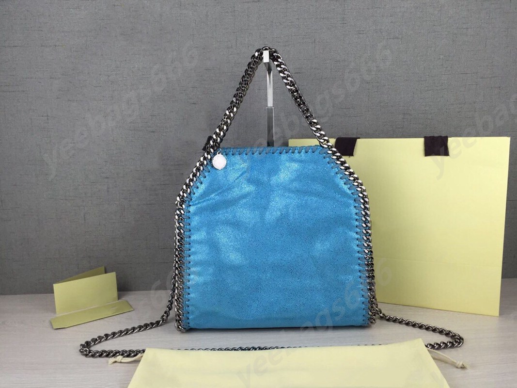 

Diagonally across various sizes large, medium and small handshake mini designer bag famous female Falabella bag