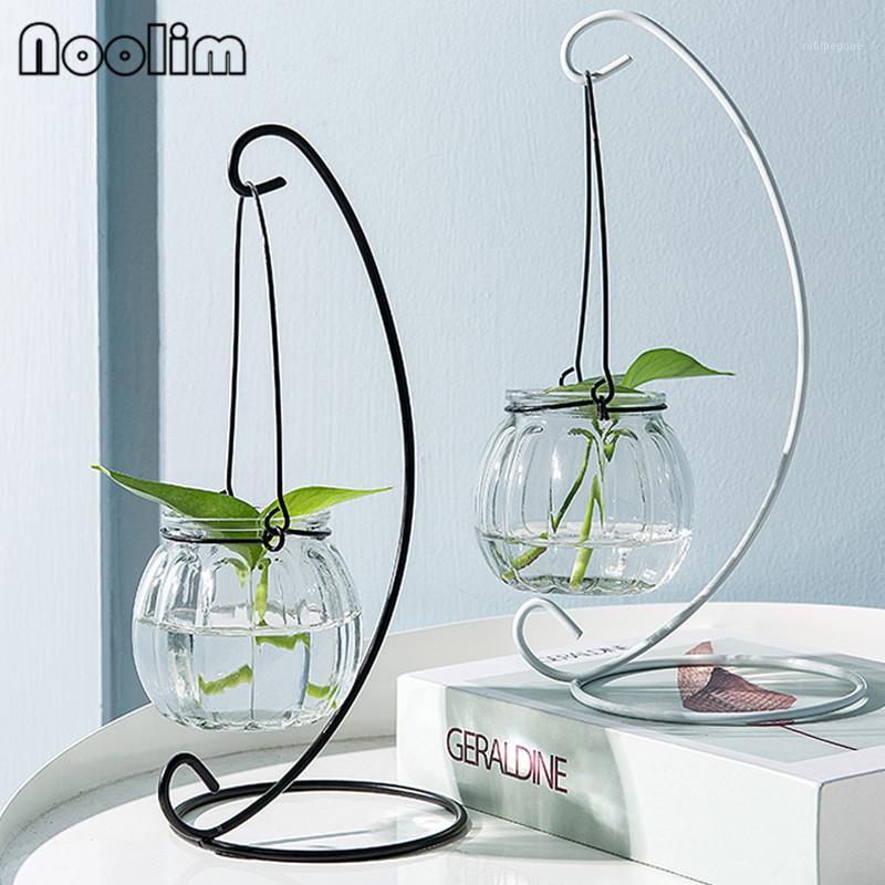 

Creative Hanging Transparent Hydroponic Glass Vase With Iron Frame Flower Pot Green Plant Wall Hanging Vase Small Fish Tank1