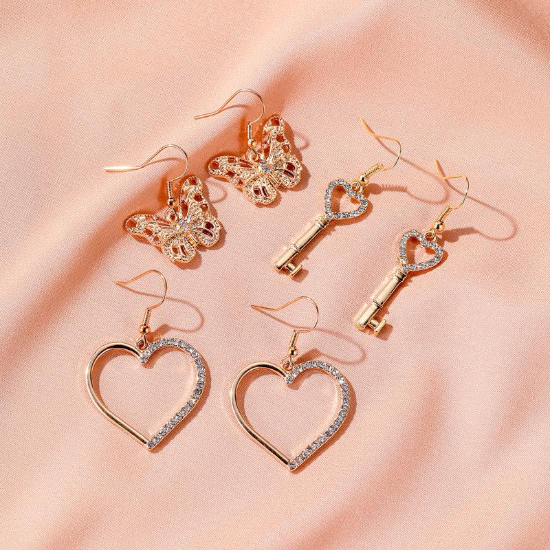 

Elegant Lady Zircon Crystal Butterfly Earrings For Women Heart Key Dangle Drop Earrings Wedding Bridal Jewelry Brincos