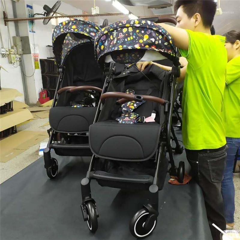 

uonibaby 2020 style children's trolley three folds, can be on the plane, can lie down and sit with sun shade and storage pocket1