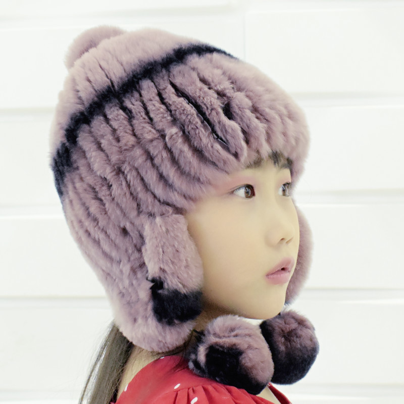

Girls put on warm winter hats with hand-knit balls rex soft rabbit skin bomber hat