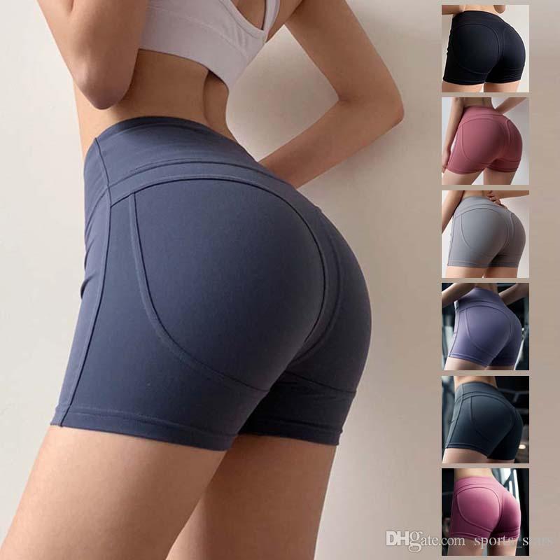 

2019 summer new fitness shorts female tight peach hip sports hot pants yoga quick-drying elastic hip three pants, Black