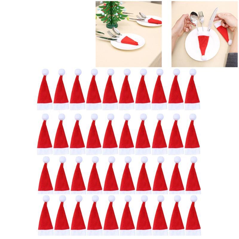 

40Pcs Christmas Decorative mini santa hats forks bag tableware knife Storage Tool Christmas Hat Tableware Cover1
