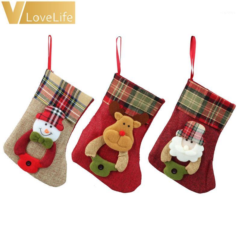 

3pcs/lot New Year Burlap Christmas Stocking Gift Bags Noel Christmas Decorations for Home Santa Claus Elk Snowman Hanging1