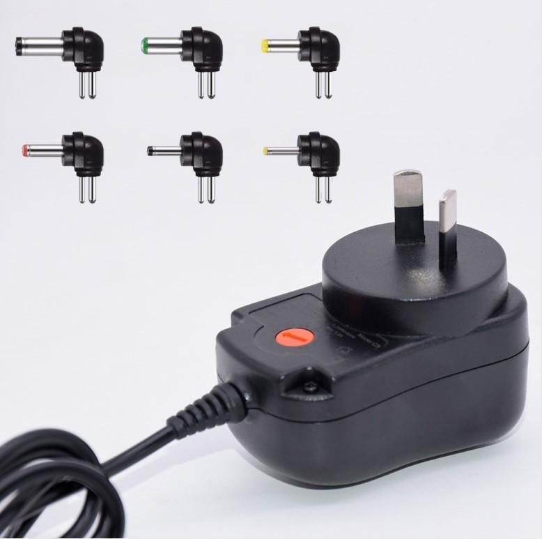 

Universal 3-12V Adjustable Voltage Power Supply 12W 1.2A Multi-function Adapter US EU UK AU Plug1