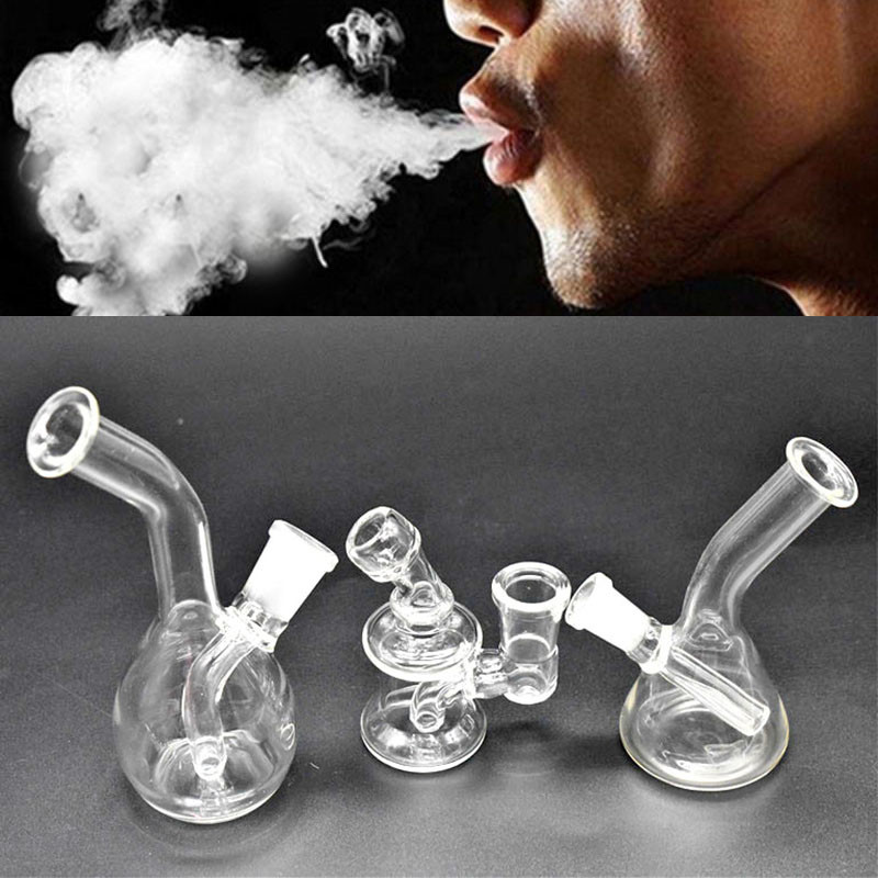 

Mini Glass beaker Bongs Dab Rigs 10mm 14mmJoint Cheap small Bubbler smoking water pipes Glass Water Bongs for smoking