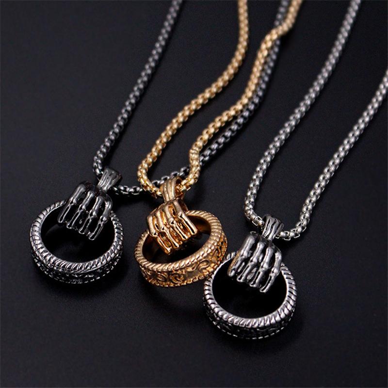 

Personality Titanium Steel Skull Hand With Rotating Tire Pendant Necklaces Stainless Chain Men Women Jewelry Gifts