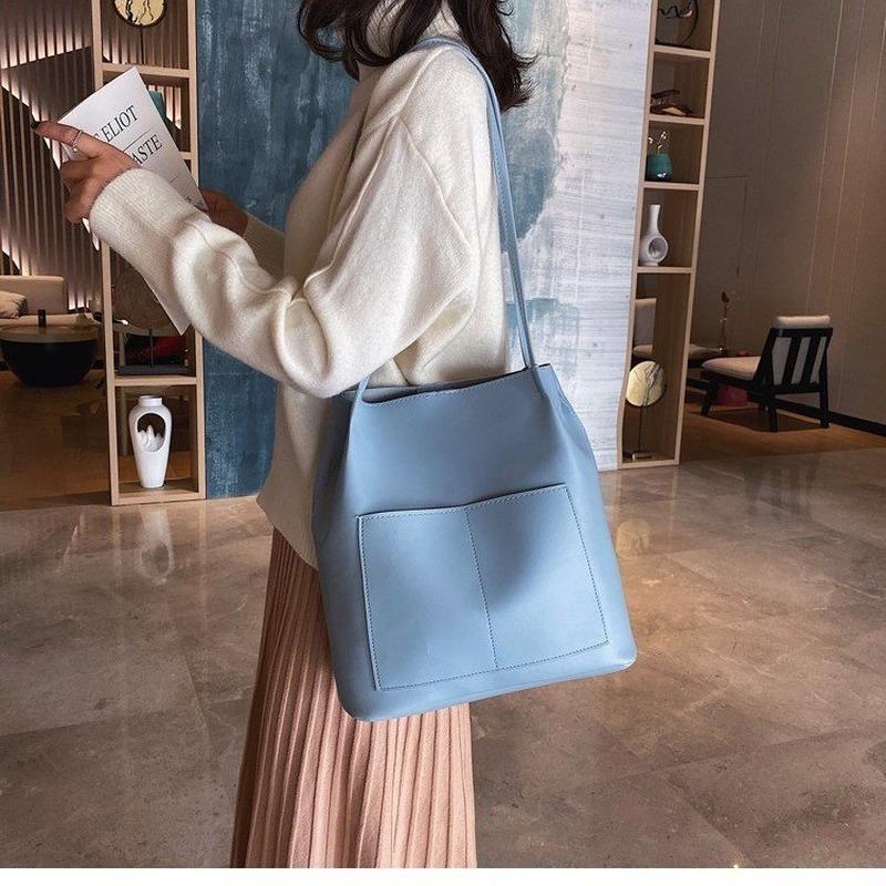 

Double pocket single shoulder bucket bag with large capacity