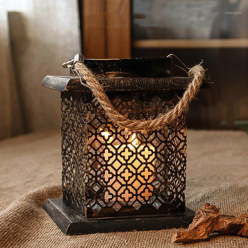 

1PC Country Style Hollow Candle Holder Portable Candlestick Candle Stand Fashion Wind Light Lantern for Home Wedding Decoration1