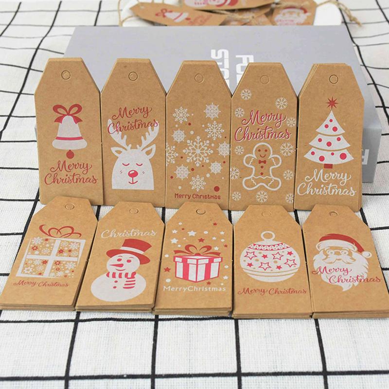 

100pcs Merry Christmas Kraft Paper Tags Gift Label DIY Hang Tags With Rope Christmas Gifts Decor Xmas New Year Natal Supplies