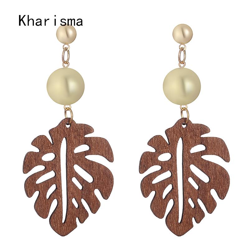 

KHARISMA Trendy Golden Beads Pom Pom Long Stud Earrings 2020 Ethnic Brown Hollow Natural Wooden Leaf Pattern Big Stud Earrings