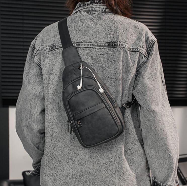 

Wholesale factory men leather clutch bags street personalized rivet handbag outdoor sports leisure plaids backpack simple joker vertical joker plaid chest bag, Plaid2 620