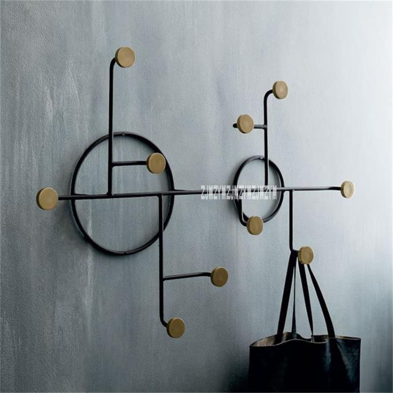 

Bedroom Key Wall Hook Living Room Wall Key Bag Creative Iron Hanger No Trace No Punching Fitting Room Coat Decoration Hook1