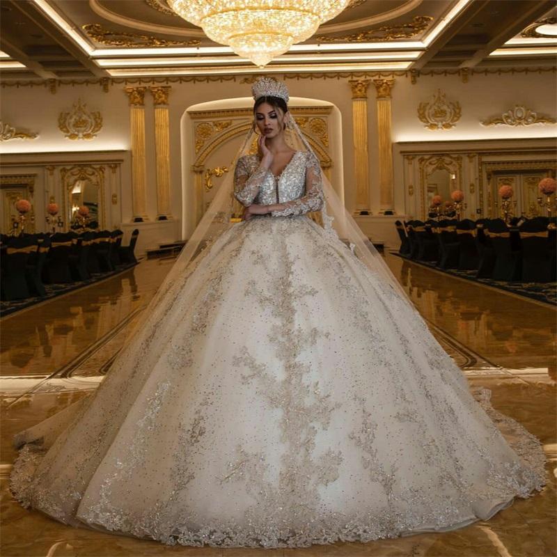 

Arab Dubai Ball Gown Wedding Dresses Luxury Long Sleeves Appliqued Crystal Beads Bridal Gowns V Neck Custom Made Vestidos De Novia, White