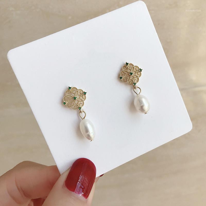 

Dominated 2020 Vintage style fine crystal temperament contracted metal hollow design pearl Women Drop earrings new1