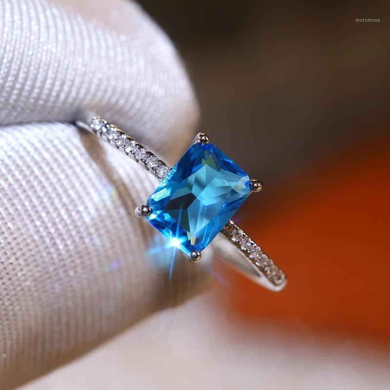 

Huitan Female Blue Rectangle Four Wedding Rings Micro Paved CZ Ring For Women Grace Engagement Gift Luxury Trendy Jewelry1