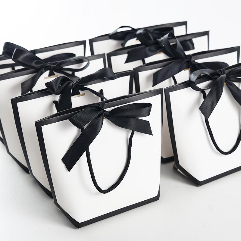 

Large Size Gold Present Box For Pajamas Clothes Books Packaging Gold Handle Paper Box Bags Kraft Paper Gift Bag With Handles Dec