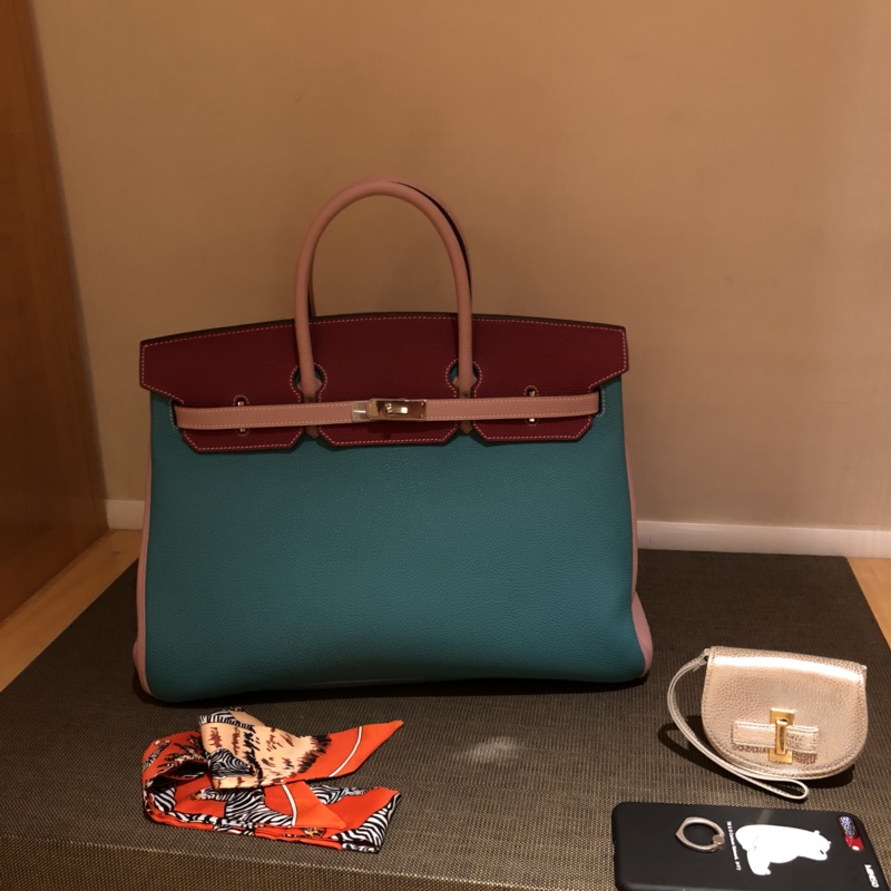 

by order only,Fully handmadequality,35cm,3tones togo leather designers purse,wax stitching,gold and silver hardware,contact for details, Multi-color