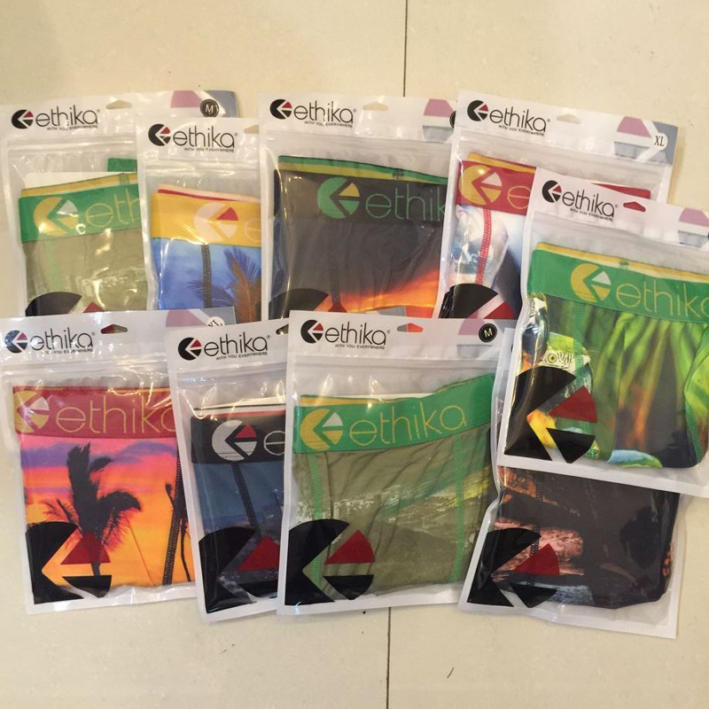 

New listing ! With packing bag men boxers Random styles underwear sports hip hop underwear street knickers quick dry wholesale boxer, As picture show