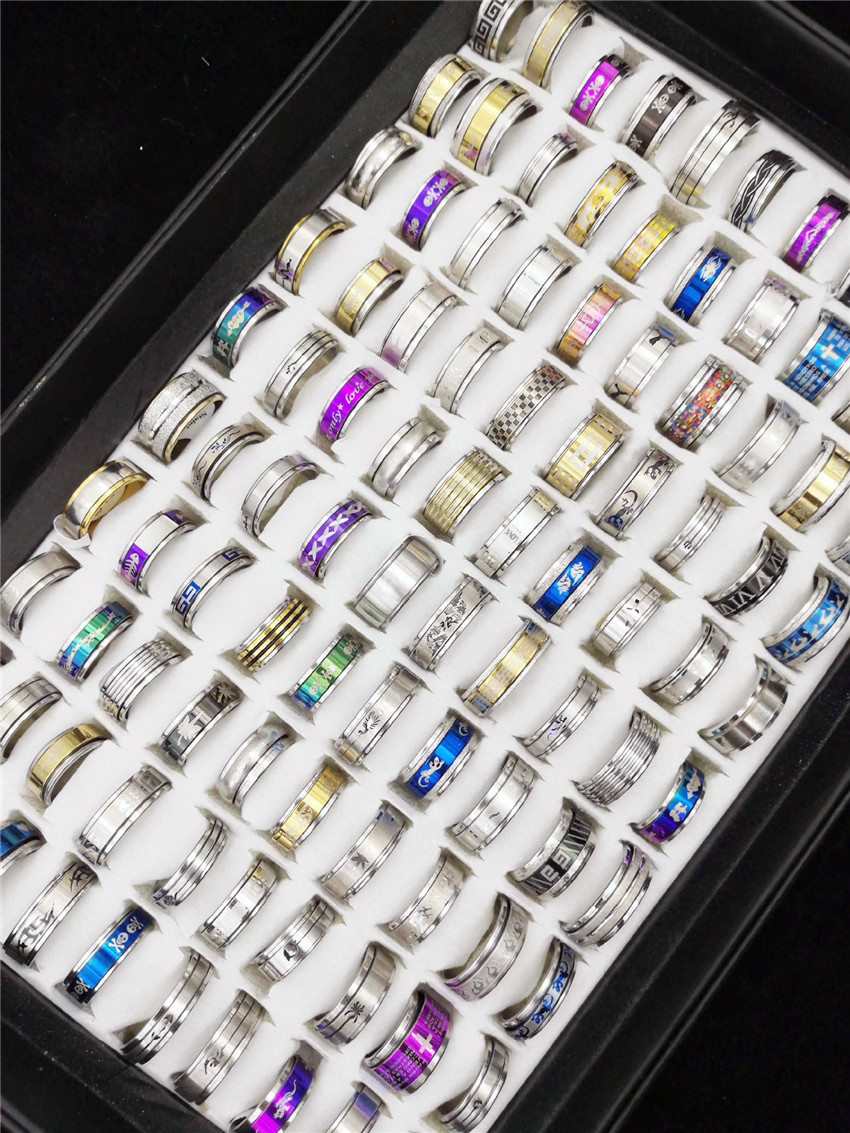 

50pcs / Box Fashionable Men's Rotating Design Letter Ring Titanium Steel Exquisite Jewelry Gift