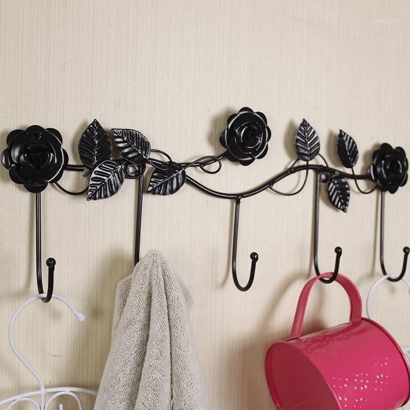 

Creative Iron rose wall hook rack Bedroom hanging home decorations Bathroom clothing towel racks.1