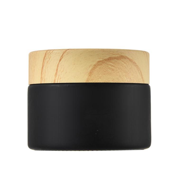 

Black frosted glass jars cosmetic jars with woodgrain plastic lids PP liner 5g 10g 15g 20g 30 50g lip balm cream containers