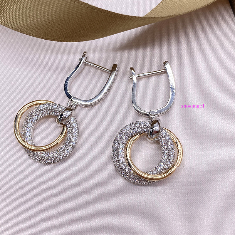 

Gold and Silver Ring Red Person Cold Wind Zirconium Ear Ring