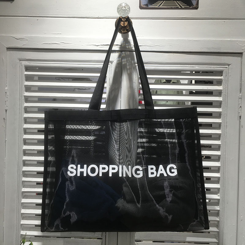 

HOT Classic white printing shopping mesh Bag fashion style Beach Travel Bag Women Wash Bag Cosmetic Makeup Storage mesh Case