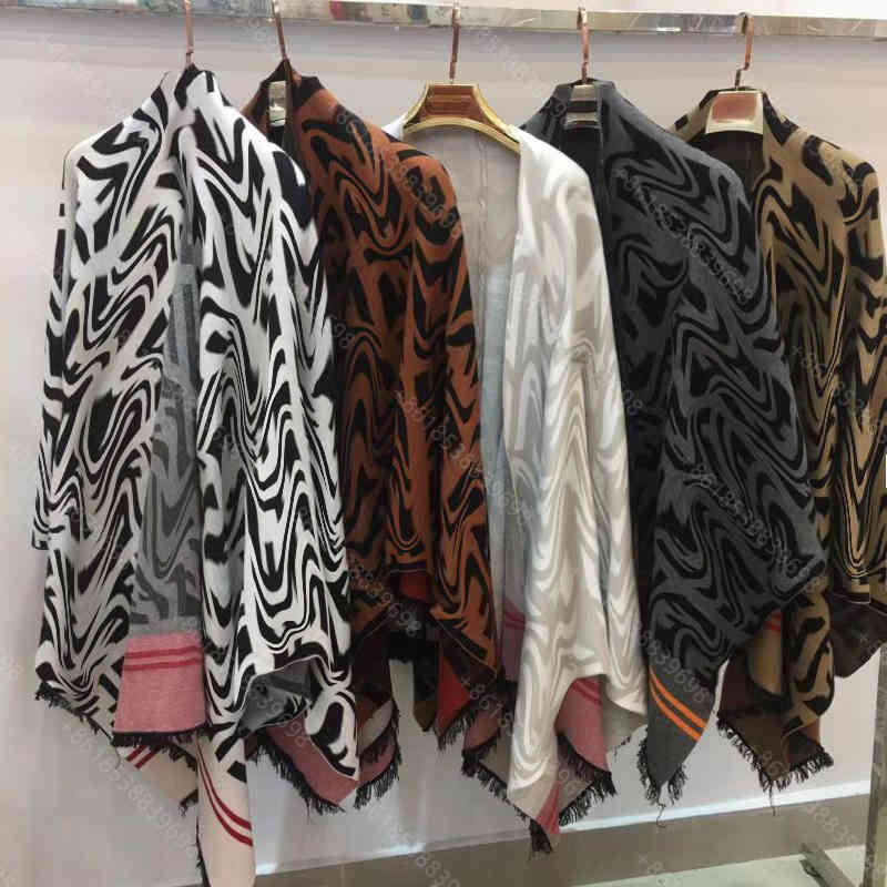 

2021ss fashion knit cape women designer wool sweaters shawl striped jacquard tassel midi coat brand letter logo luxury girls clothes winter loose windbreaker
