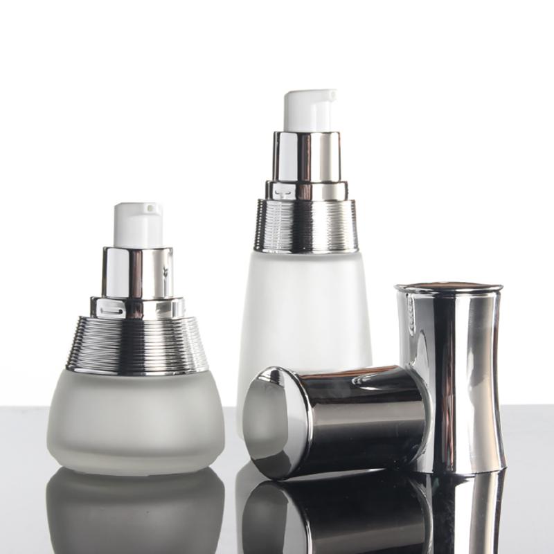 

New style 30ml travel cosmetic bottle portable lotion glass bottle with pump, empty 1 oz luxury glass pump container